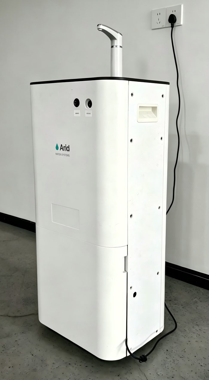 Arid Home demonstration unit, three-quarter view showing the side carry handle